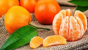 sweet and ripe mandarines with leaves