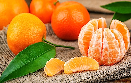 sweet and ripe mandarines with leaves