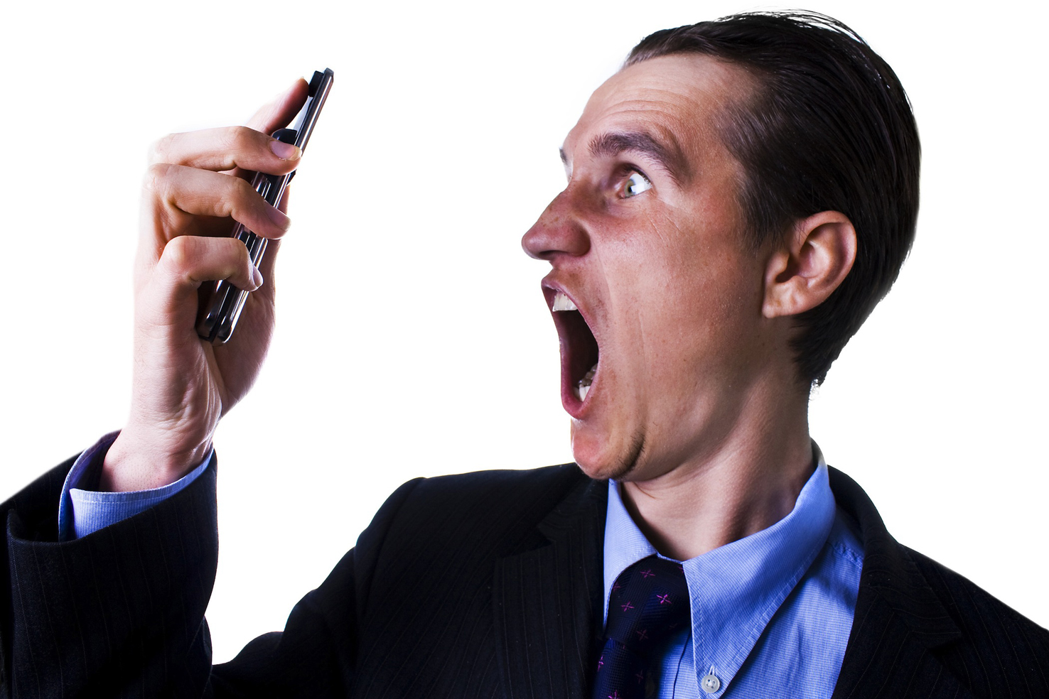 businessman looking and screaming at phone