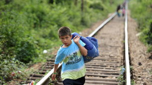 UNICEF196290_MigrantBoy