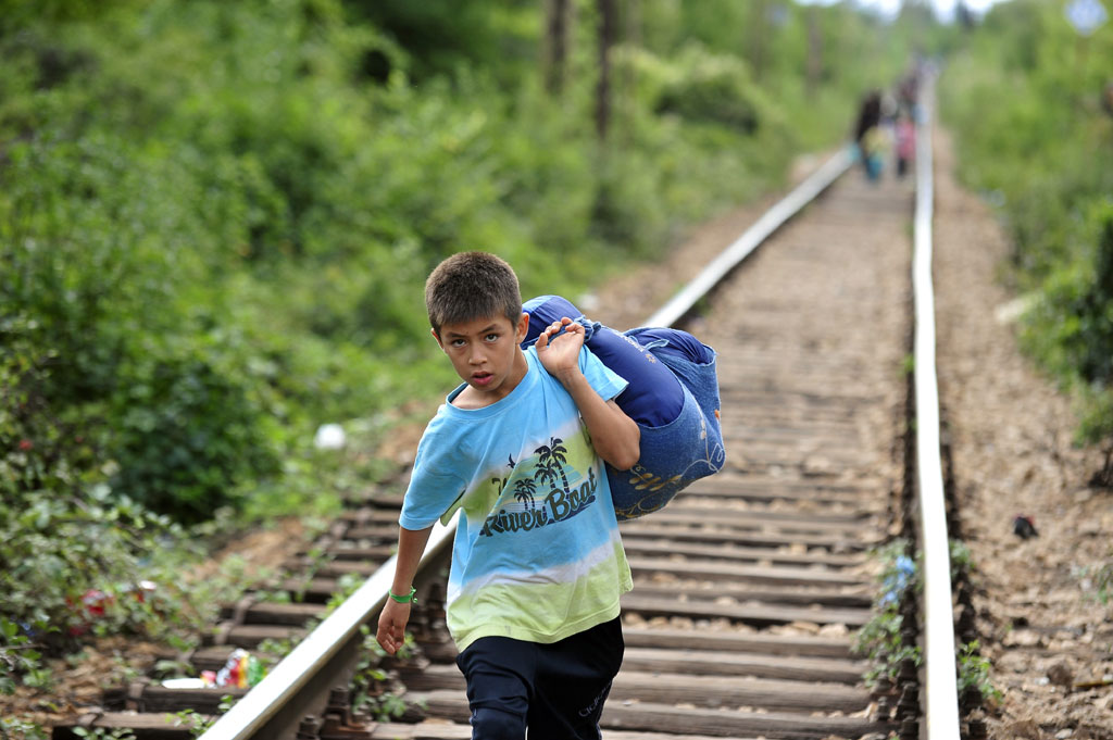 UNICEF196290_MigrantBoy