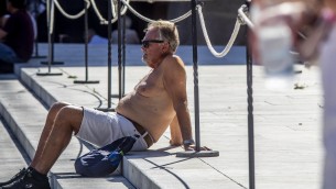 Caldo in Italia, bollino arancione oggi in 17 città