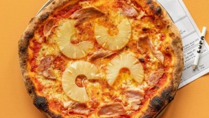 Pizza all'ananas a 118 euro, si riaccende il dibattito: provocazione o lusso gastronomico?